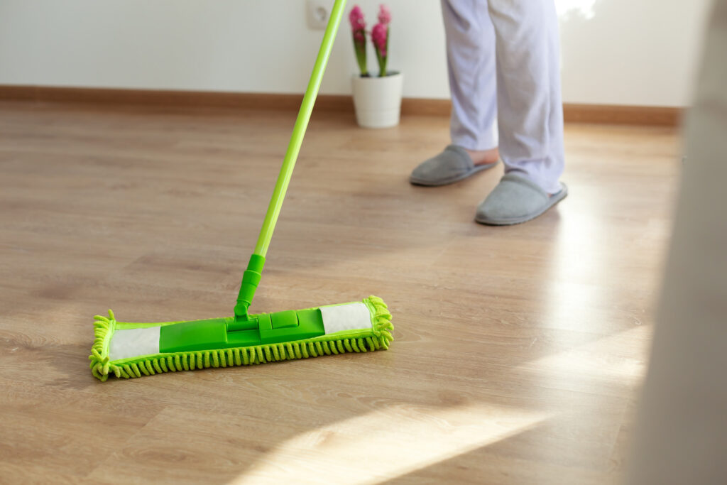 Mopping laminate floor. Household equipment